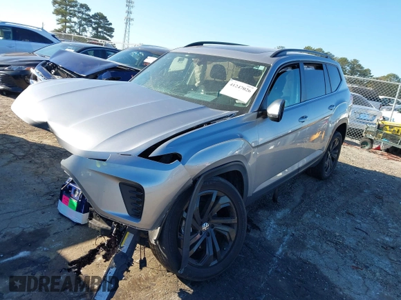 2022 Volkswagen Atlas SE z VIN 1V2JP2CA6NC502757, wystawiony jako IAAI lot #41247026 z przebiegiem 70 124 mil mil oraz . Historia ofert i sprzedaży dostępna na DreamBid. Obrazek 17.