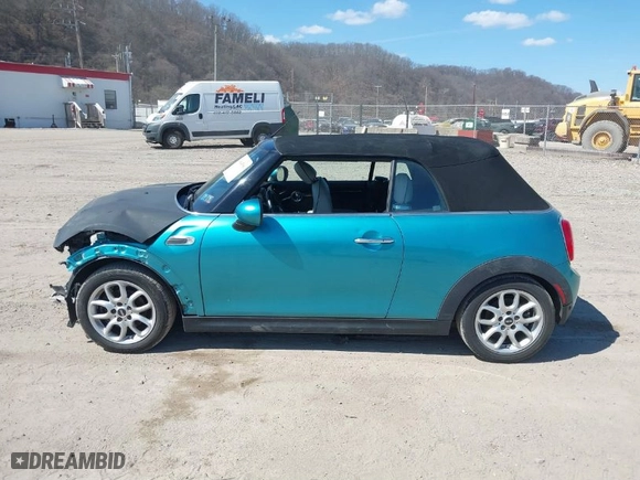 2016 MINI Cooper Convertible with VIN WMWWG5C53G3C18842, listed as a IAAI auction lot 41864596 with 91,253 mi miles. Bid and sale history available at carsss.com. Image 14.