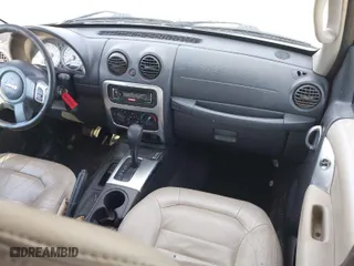 2004 Jeep Liberty Limited with VIN 1J4GK58KX4W110899, listed as a IAAI auction lot 41544199 with 242,501 mi miles. Bid and sale history available at carsss.com. Image 5.