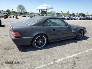 1992 Mercedes-Benz 500 z VIN WDBFA66E9NF050217, wystawiony jako Copart lot #58065965 z przebiegiem 143 456 mil mil oraz Tytuł czysty. Historia ofert i sprzedaży dostępna na DreamBid. Obrazek 3.
