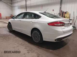2017 Ford Fusion Titanium with VIN 3FA6P0K98HR124178, listed as a IAAI auction lot 42207938 with 89,352 mi miles and . Bid and sale history available at DreamBid. Image 3.