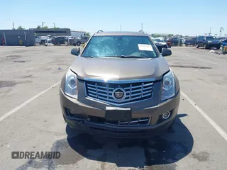 2015 Cadillac SRX Performance Collection with VIN 3GYFNFE35FS569682, listed as a IAAI auction lot 42322229 with 124,365 mi miles and . Bid and sale history available at DreamBid. Image 12.