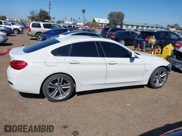 2019 BMW 4 Series 430i with VIN WBA4J1C54KBM18190, listed as a IAAI auction lot 42012759 with 73,598 mi miles. Bid and sale history available at carsss.com. Image 14.
