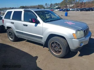 2005 Jeep Grand Cherokee Laredo with VIN 1J4HR48N65C595873, listed as a IAAI auction lot 41715998 with 145,689 mi miles. Bid and sale history available at carsss.com. Image 1.