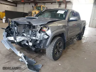 2017 Toyota Tacoma SR5 with VIN 3TMCZ5AN1HM046326, listed as a IAAI auction lot 41808776 with 96,021 mi miles. Bid and sale history available at carsss.com. Image 2.