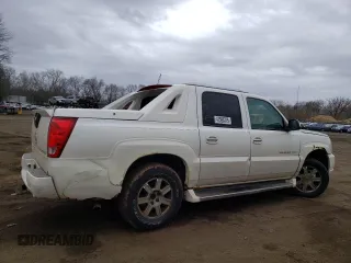 2003 Cadillac Escalade EXT z VIN 3GYEK63N13G145634, wystawiony jako Copart lot #47593375 z przebiegiem 287 512 mil mil oraz Nie do naprawy. Historia ofert i sprzedaży dostępna na DreamBid. Obrazek 3.