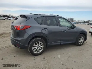 2014 Mazda CX-5 Touring with VIN JM3KE2CY0E0423991, listed as a Copart auction lot 45611695 with 121,474 mi miles and Salvage Title. Bid and sale history available at carsss.com. Image 3.