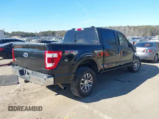 2021 Ford F-150 XL with VIN 1FTFW1E58MFA84347, listed as a IAAI auction lot 41402387 with 133,150 mi miles. Bid and sale history available at carsss.com. Image 4.