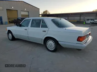 1989 Mercedes-Benz 560 with VIN WDBCA39E7KA453389, listed as a Copart auction lot 45884155 with 231,828 mi miles and Clean Title. Bid and sale history available at DreamBid. Image 2.