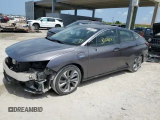 2018 Honda Clarity Touring z VIN JHMZC5F39JC002227, wystawiony jako Copart lot #62408185 z przebiegiem 124 647 mil mil oraz Szkoda całkowita • Salvage title. Historia ofert i sprzedaży dostępna na DreamBid. Obrazek 1.