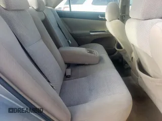 2006 Toyota Camry STD z VIN 4T1BE32K76U660821, wystawiony jako Copart lot #58806275 z przebiegiem 187 990 mil mil oraz Szkoda całkowita • Salvage title. Historia ofert i sprzedaży dostępna na DreamBid. Obrazek 10.