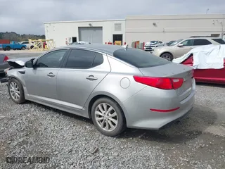 2015 Kia Optima EX with VIN 5XXGN4A75FG405216, listed as a IAAI auction lot 41794597 with 237,403 mi miles. Bid and sale history available at carsss.com. Image 3.