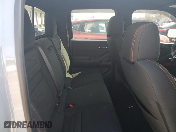 2022 Nissan Frontier Pro-4X with VIN 1N6ED1EK3NN676511, listed as a Copart auction lot 52030375 with 34,753 mi miles and Salvage title. Bid and sale history available at DreamBid. Image 11.