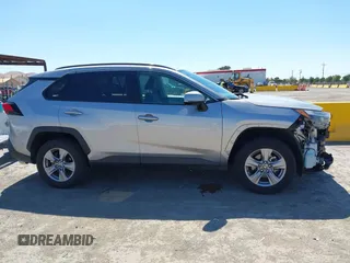 2022 Toyota RAV4 Hybrid XLE with VIN 4T3RWRFV2NU066761, listed as a IAAI auction lot 42784621 with 24,711 mi miles and . Bid and sale history available at DreamBid. Image 14.