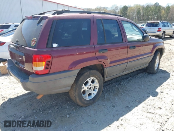2003 Jeep Grand Cherokee Laredo with VIN 1J4GX48S93C523831, listed as a IAAI auction lot 41852442 with 270,735 mi miles. Bid and sale history available at carsss.com. Image 4.