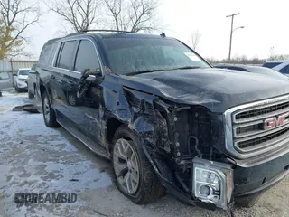 2015 GMC Yukon XL SLT with VIN 1GKS2HKC6FR257133, listed as a IAAI auction lot 41385913 with 150,238 mi miles. Bid and sale history available at carsss.com. Image 6.