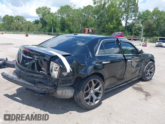2014 Chrysler 300 C with VIN 2C3CCAKT9EH171614, listed as a IAAI auction lot 39747704 with 129,156 mi miles and . Bid and sale history available at carsss.com. Image 12.