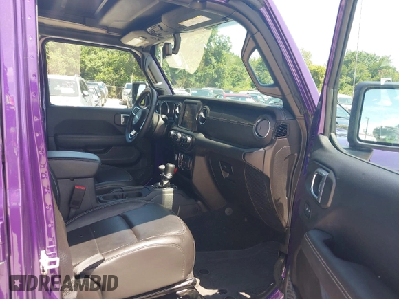 2023 Jeep Wrangler High Altitude z VIN 1C4HJXEN9PW560958, wystawiony jako IAAI lot #42393559 z przebiegiem 35 981 mil mil oraz . Historia ofert i sprzedaży dostępna na DreamBid. Obrazek 5.