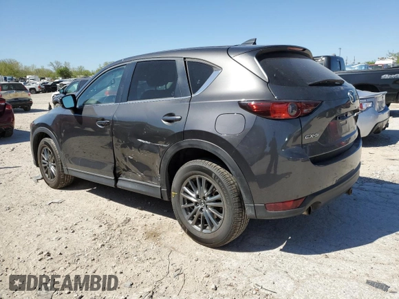 2017 Mazda CX-5 Touring with VIN JM3KFACL1H0100436, listed as a Copart auction lot 53058875 with 77,205 mi miles and Salvage Title. Bid and sale history available at DreamBid. Image 2.