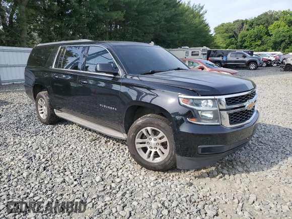 2015 Chevrolet Suburban LT with VIN 1GNSKJKC4FR192292, listed as a Copart auction lot 60434444 with 304,830 mi miles and Salvage Title. Bid and sale history available at DreamBid. Image 4.