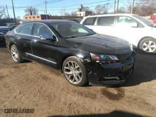 2014 Chevrolet Impala LTZ with VIN 1G1145SLXEU148131, listed as a IAAI auction lot 41234896 with 124,304 mi miles. Bid and sale history available at carsss.com. Image 1.
