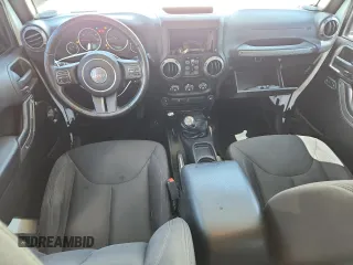 2015 Jeep Wrangler Unlimited Freedom with VIN 1C4HJWDGXFL755528, listed as a Copart auction lot 64927525 with 111,096 mi miles and Salvage title. Bid and sale history available at DreamBid. Image 8.