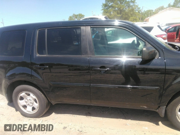 2015 Honda Pilot SE with VIN 5FNYF4H38FB071223, listed as a IAAI auction lot 42013352 with 196,617 mi miles and . Bid and sale history available at DreamBid. Image 13.