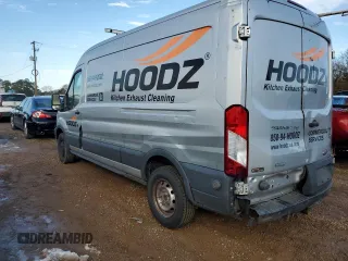 2015 Ford Transit with VIN 1FTNR2CG3FKA61677, listed as a Copart auction lot 87996715 with 178,460 mi miles and Salvage Title. Bid and sale history available at DreamBid. Image 2.