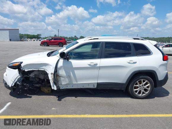 2016 Jeep Cherokee Latitude with VIN 1C4PJLCB0GW291357, listed as a IAAI auction lot 42312356 with 105,692 mi miles and . Bid and sale history available at DreamBid. Image 15.
