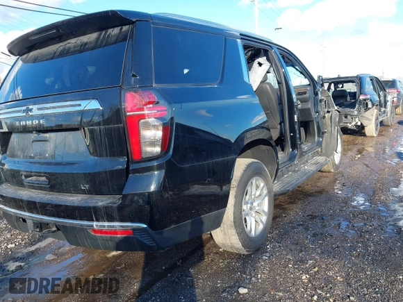 2022 Chevrolet Tahoe LT with VIN 1GNSKNKDXNR312014, listed as a IAAI auction lot 41666093 with Not provided miles and . Bid and sale history available at DreamBid. Image 4.