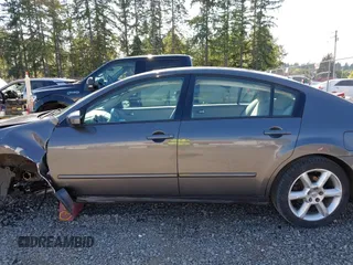 2005 Nissan Maxima SE z VIN 1N4BA41E55C836812, wystawiony jako IAAI lot #42433720 z przebiegiem Nie podano mil oraz . Historia ofert i sprzedaży dostępna na DreamBid. Obrazek 14.
