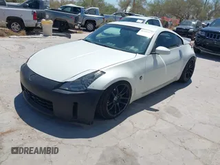 2004 Nissan 350Z Touring with VIN JN1AZ34E34T060024, listed as a IAAI auction lot 42327915 with 96,197 mi miles and . Bid and sale history available at DreamBid. Image 2.