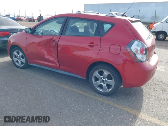 2009 Pontiac Vibe with VIN 5Y2SM67009Z401692, listed as a IAAI auction lot 41769199 with 143,904 mi miles. Bid and sale history available at carsss.com. Image 3.