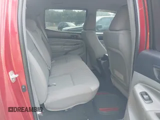 2014 Toyota Tacoma with VIN 3TMMU4FN8EM068048, listed as a IAAI auction lot 42633506 with 126,339 mi miles and . Bid and sale history available at DreamBid. Image 8.
