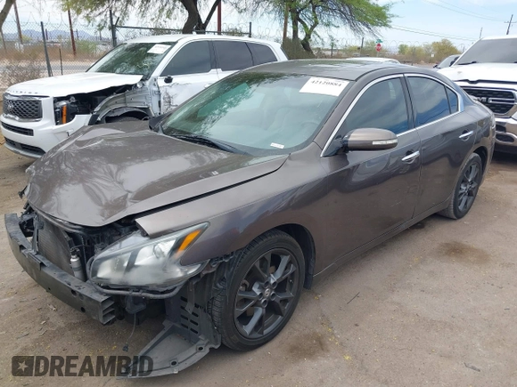 2014 Nissan Maxima S with VIN 1N4AA5AP0EC431251, listed as a IAAI auction lot 42120884 with 163,628 mi miles and . Bid and sale history available at DreamBid. Image 2.