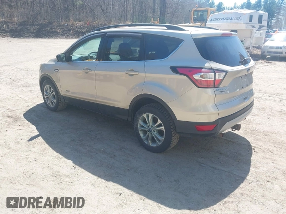 2017 Ford Escape SE with VIN 1FMCU9GD1HUD23228, listed as a IAAI auction lot 42074213 with 115,757 mi miles. Bid and sale history available at carsss.com. Image 3.