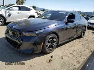 2024 BMW i5 eDrive40 with VIN WBY33FK03RCS14771, listed as a Copart auction lot 62393255 with 25,192 mi miles and Salvage title. Bid and sale history available at DreamBid. Image 1.