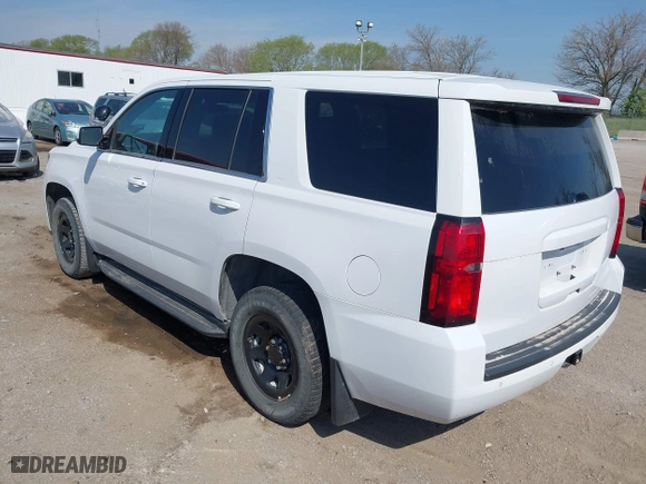 2020 Chevrolet Tahoe Commercial with VIN 1GNSKDEC8LR258254, listed as a IAAI auction lot 42104608 with 105,895 mi miles. Bid and sale history available at carsss.com. Image 3.