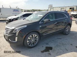 2017 Cadillac XT5 Premium Luxury AWD z VIN 1GYKNERS3HZ185853, wystawiony jako Copart lot #53446175 z przebiegiem 89 669 mil mil oraz Szkody całkowita. Historia ofert i sprzedaży dostępna na DreamBid. Obrazek 1.