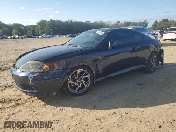 2005 Hyundai Tiburon GT z VIN KMHHN65F85U158764, wystawiony jako Copart lot #80060884 z przebiegiem 121 747 mil mil oraz Czysty tytuł • Clean title. Historia ofert i sprzedaży dostępna na DreamBid. Obrazek 1.
