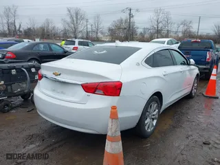 2020 Chevrolet Impala LT with VIN 1G11Z5S38LU112324, listed as a IAAI auction lot 41536853 with 104,027 mi miles. Bid and sale history available at carsss.com. Image 4.