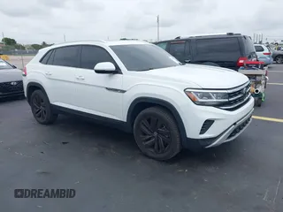2023 Volkswagen Atlas SE z VIN 1V2JE2CA3PC227230, wystawiony jako IAAI lot #42435466 z przebiegiem 86 217 mil mil oraz . Historia ofert i sprzedaży dostępna na DreamBid. Obrazek 1.