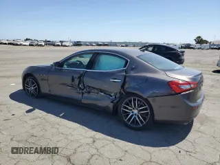 2016 Maserati Ghibli S with VIN ZAM57RSA3G1169053, listed as a Copart auction lot 58970355 with 73,843 mi miles and Salvage title. Bid and sale history available at DreamBid. Image 2.
