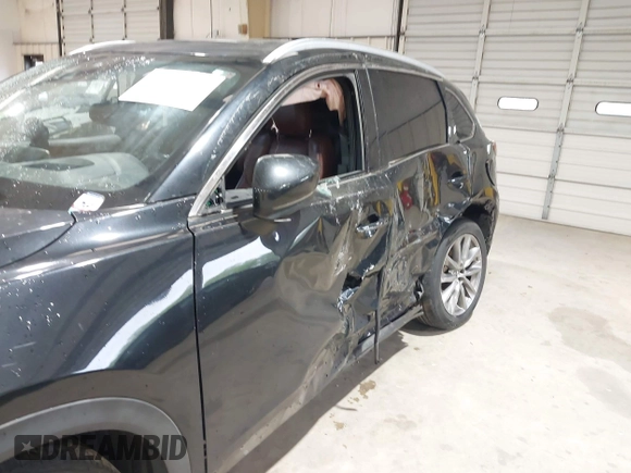 2016 Mazda CX-9 Signature z VIN JM3TCBEY5G0111286, wystawiony jako IAAI lot #42018161 z przebiegiem 155 920 mil mil oraz . Historia ofert i sprzedaży dostępna na DreamBid. Obrazek 6.