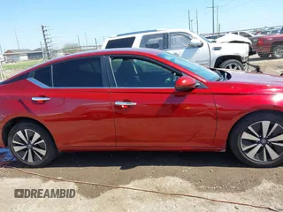 2022 Nissan Altima 2.5 SV with VIN 1N4BL4DV4NN329202, listed as a IAAI auction lot 41674663 with 52,724 mi miles. Bid and sale history available at carsss.com. Image 13.