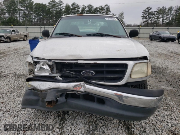 2000 Ford F-150 XL z VIN 1FTRX17WXYNB88124, wystawiony jako Copart lot #43602225 z przebiegiem Nie podano mil oraz Szkoda całkowita • Salvage title. Historia ofert i sprzedaży dostępna na DreamBid. Obrazek 5.