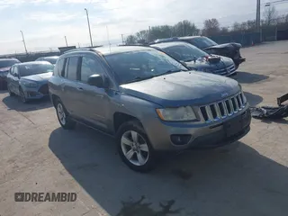 2013 Jeep Compass Sport with VIN 1C4NJCBB2DD174668, listed as a IAAI auction lot 42104977 with 213,123 mi miles. Bid and sale history available at carsss.com. Image 1.
