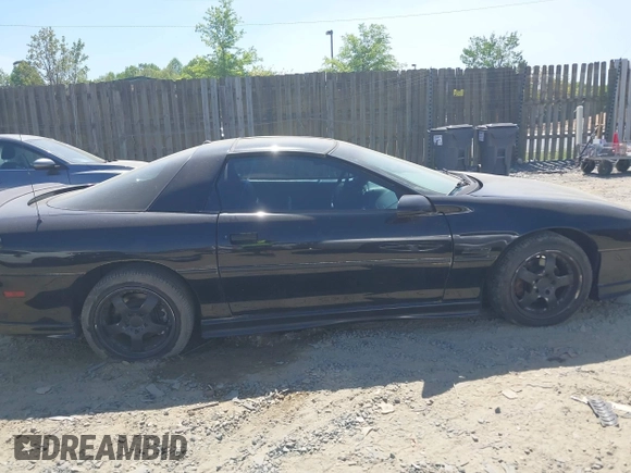 1998 Chevrolet Camaro Z28 z VIN 2G1FP22G2W2118336, wystawiony jako IAAI lot #42112851 z przebiegiem 122 385 mil mil oraz . Historia ofert i sprzedaży dostępna na DreamBid. Obrazek 13.