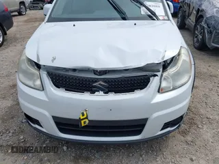 2012 Suzuki SX4 Crossover z VIN JS2YB5A35C6304967, wystawiony jako IAAI lot #42282088 z przebiegiem 152 232 mil mil oraz . Historia ofert i sprzedaży dostępna na DreamBid. Obrazek 6.