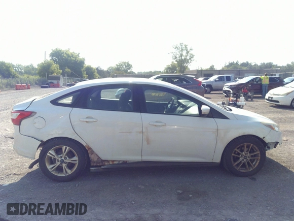 2013 Ford Focus SE with VIN 1FADP3F28DL215983, listed as a IAAI auction lot 42659890 with 117,912 mi miles and . Bid and sale history available at DreamBid. Image 13.